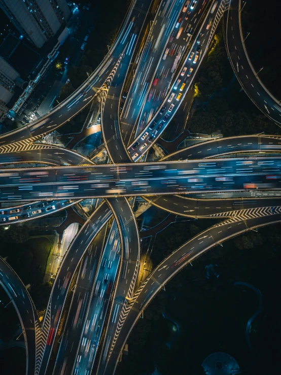 an aerial view of a highway intersection at night, pexels contest winner, futurism, thumbnail, multiple stories, intricate wires, shanghai