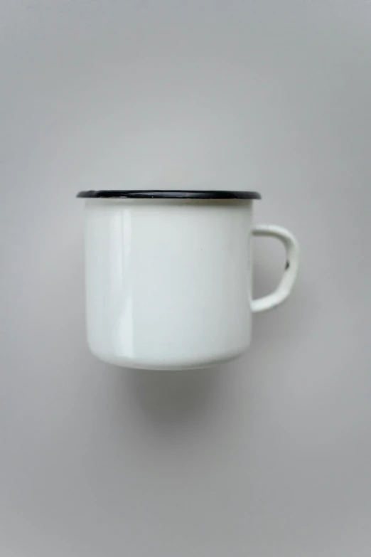 a white coffee cup with a black rim, by Hendrik Gerritsz Pot, bauhaus, enamel, on grey background, thumbnail, 000