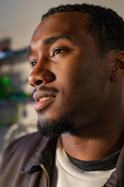 a close up of a person wearing a jacket, happening, mkbhd as iron man, in a lab, profile portrait, biological