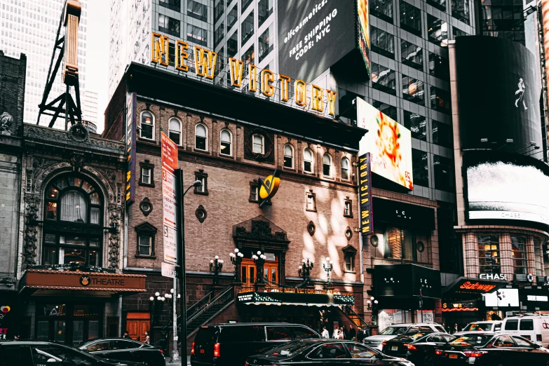 a city street filled with lots of traffic and tall buildings, a photo, pexels contest winner, art nouveau, theater stage, background image, new york, 🦩🪐🐞👩🏻🦳