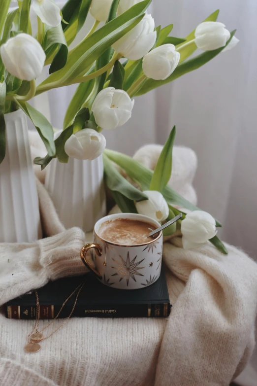 a bouquet of white tulips next to a cup of coffee, pexels contest winner, romanticism, storybook style, gif, cozy setting, browns and whites