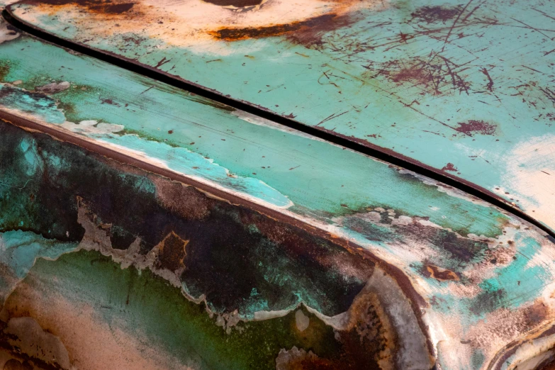 a rusted old car sitting on the side of the road, by Jim Nelson, unsplash, auto-destructive art, copper and emerald, abstract detail, archival pigment print, rectangle