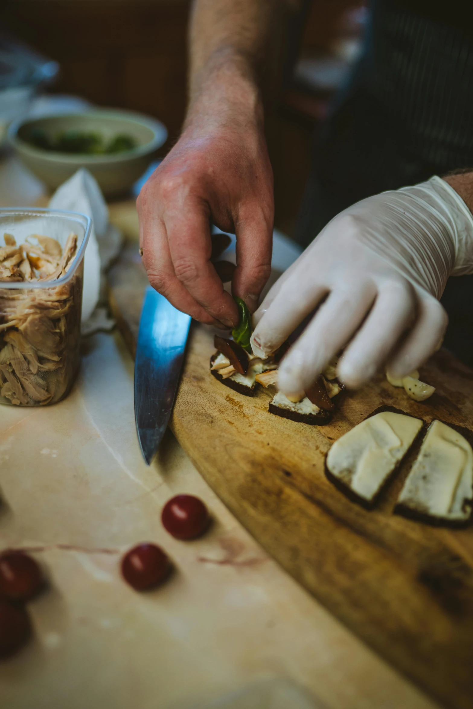 a close up of a person cutting food on a cutting board, cheeses, thumbnail, brown, botanicals