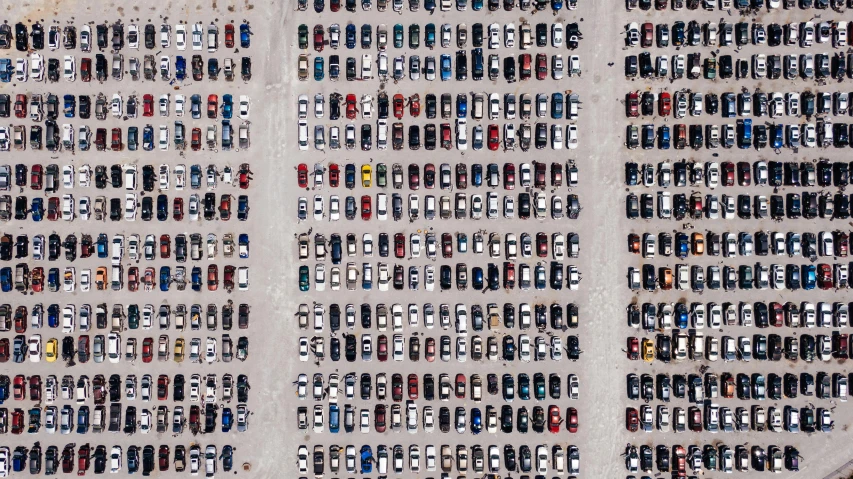 a parking lot filled with lots of parked cars, inspired by Andreas Gursky, unsplash contest winner, auto-destructive art, ignant, square, tx, junk yard