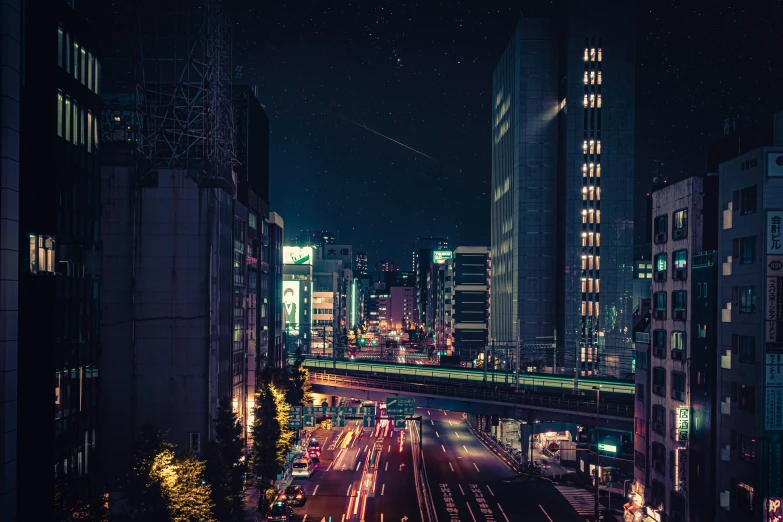 a city street filled with lots of tall buildings, by Beeple, unsplash contest winner, japan at night, instagram post, hyperdetailed photo, 2022 photograph