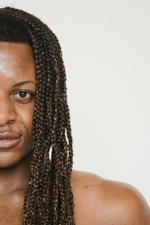 a close up of a person with long hair, arik roper, genderless, pose 4 of 1 6, ( ( brown skin ) )