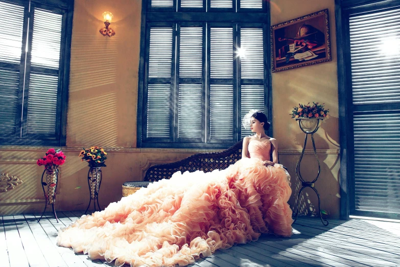 a woman in a pink dress sitting in a room, pixabay, baroque, beautiful wedding dress, youtube thumbnail, evening sun, vera wang couture