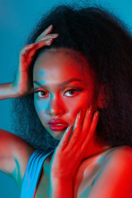 a woman in a blue dress posing with her hands on her head, an album cover, trending on pexels, realism, red and blue black light, brown skin. light makeup, neon jungle, black teenage girl