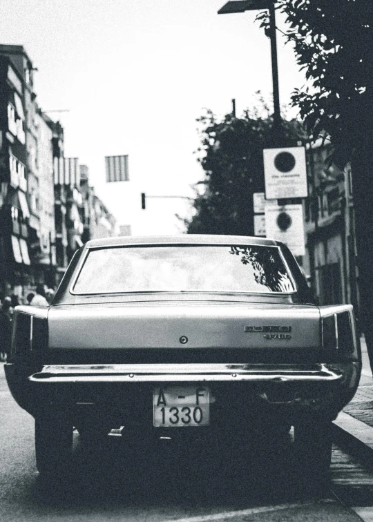 a black and white photo of a car on a city street, inspired by Elsa Bleda, unsplash, purism, album cover art, japanese heritage, muscle cars, 🚿🗝📝