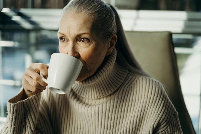 an older woman drinking a cup of coffee, pexels contest winner, manuka, profile image, thumbnail, handsome