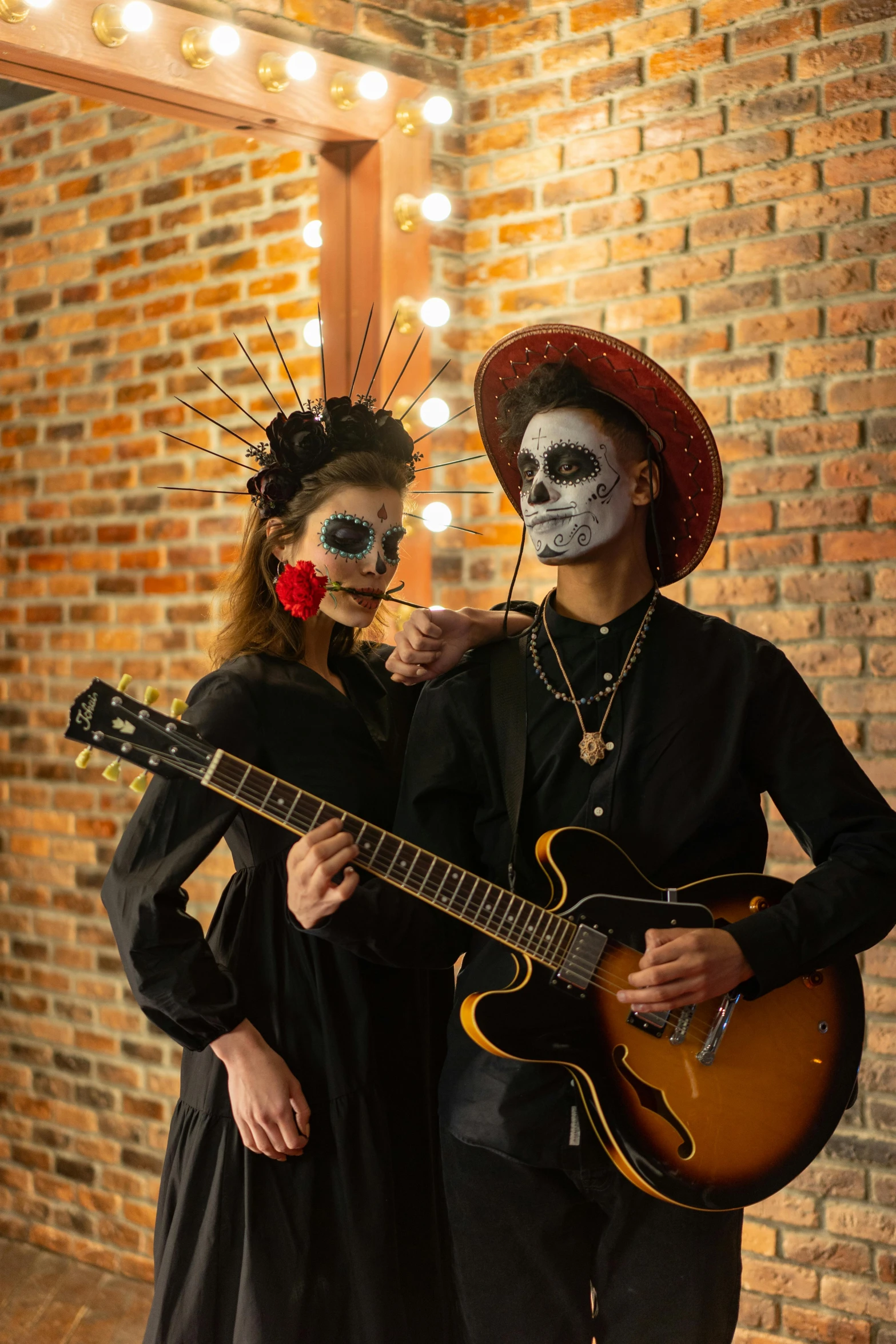 a man and a woman in day of the dead costumes, an album cover, pexels contest winner, evil guitars, vantablack wall, low quality photo, profile picture