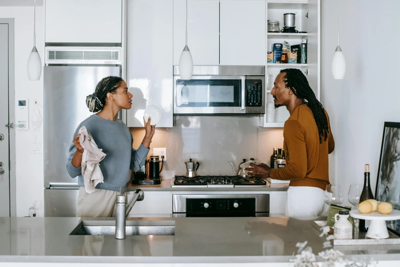 a couple of women standing in a kitchen, pexels contest winner, avatar image, ashteroth, fan favorite, men and women