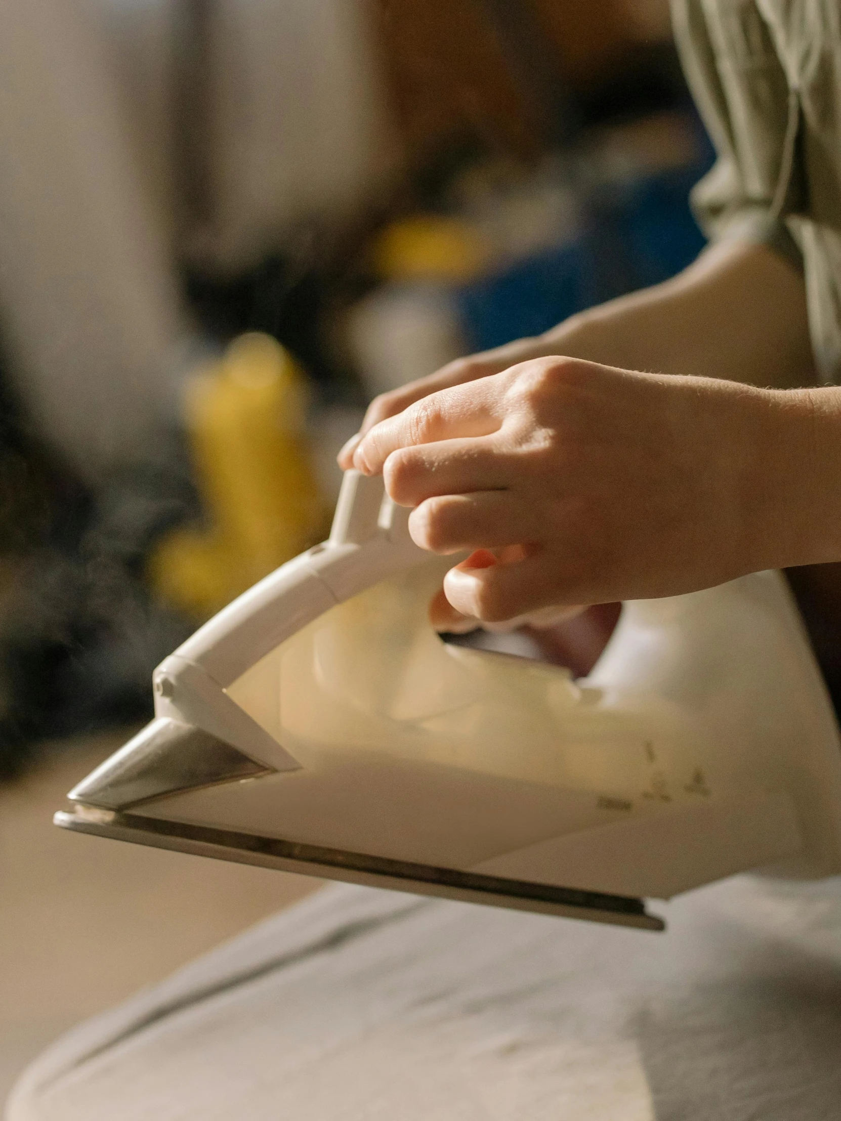 a person ironing something on an ironing board, off-white plated armor, profile image, ignant, thumbnail