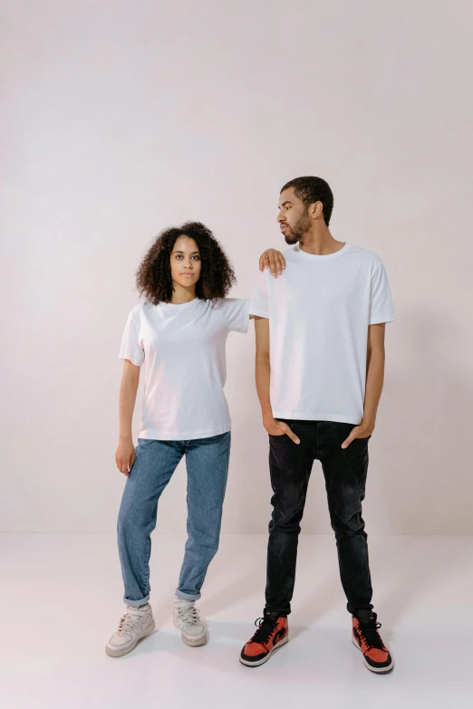 a man and a woman standing next to each other, plain white tshirt, curated collections, promo image, various sizes