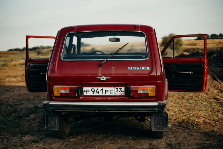 a red truck parked on the side of a dirt road, pexels contest winner, renaissance, russian lada car, square, william eggleston style, 000 — википедия