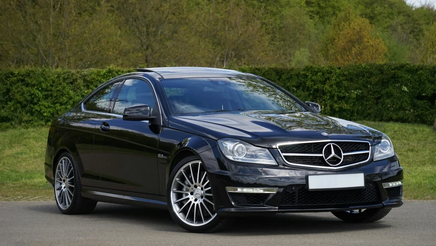 a black mercedes cla parked on the side of the road, pexels contest winner, 2263539546], former, chromatic, rectangular