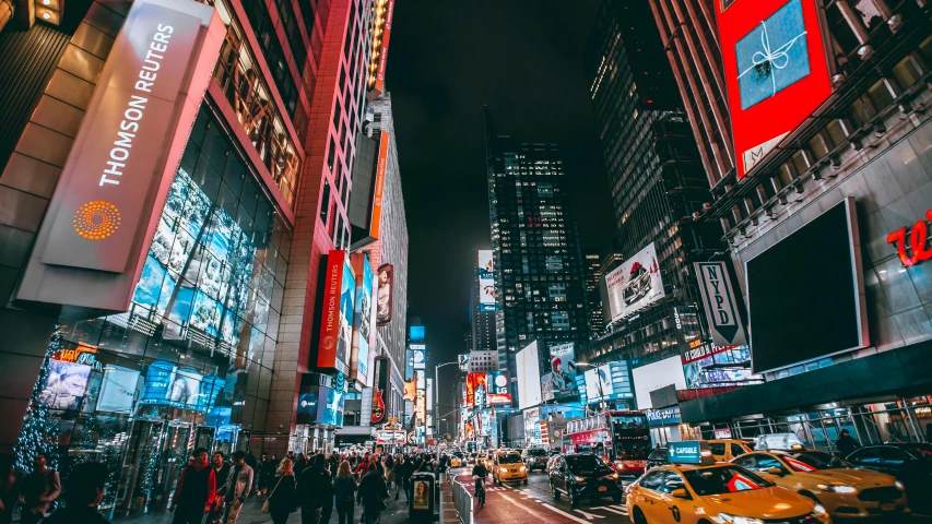 a busy city street filled with lots of traffic, pexels contest winner, visual art, new york city at night, neon advertisements, thumbnail, billboard image