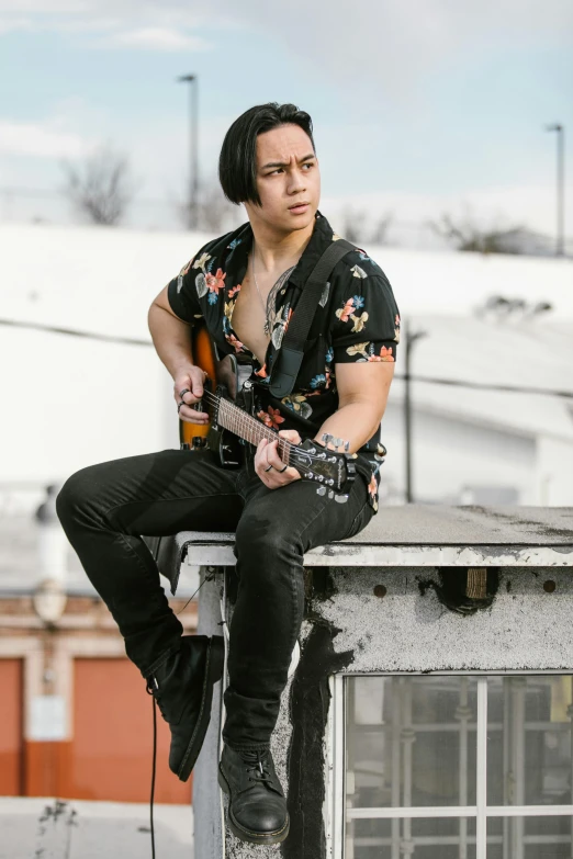 a man sitting on top of a roof with a guitar, taejune kim, chest up bust shot, non-binary, looking to the side off camera