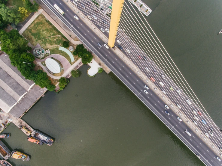 an aerial view of a bridge over a body of water, by Joze Ciuha, pexels contest winner, visual art, são paulo, floating power cables, santiago calatrava, thumbnail