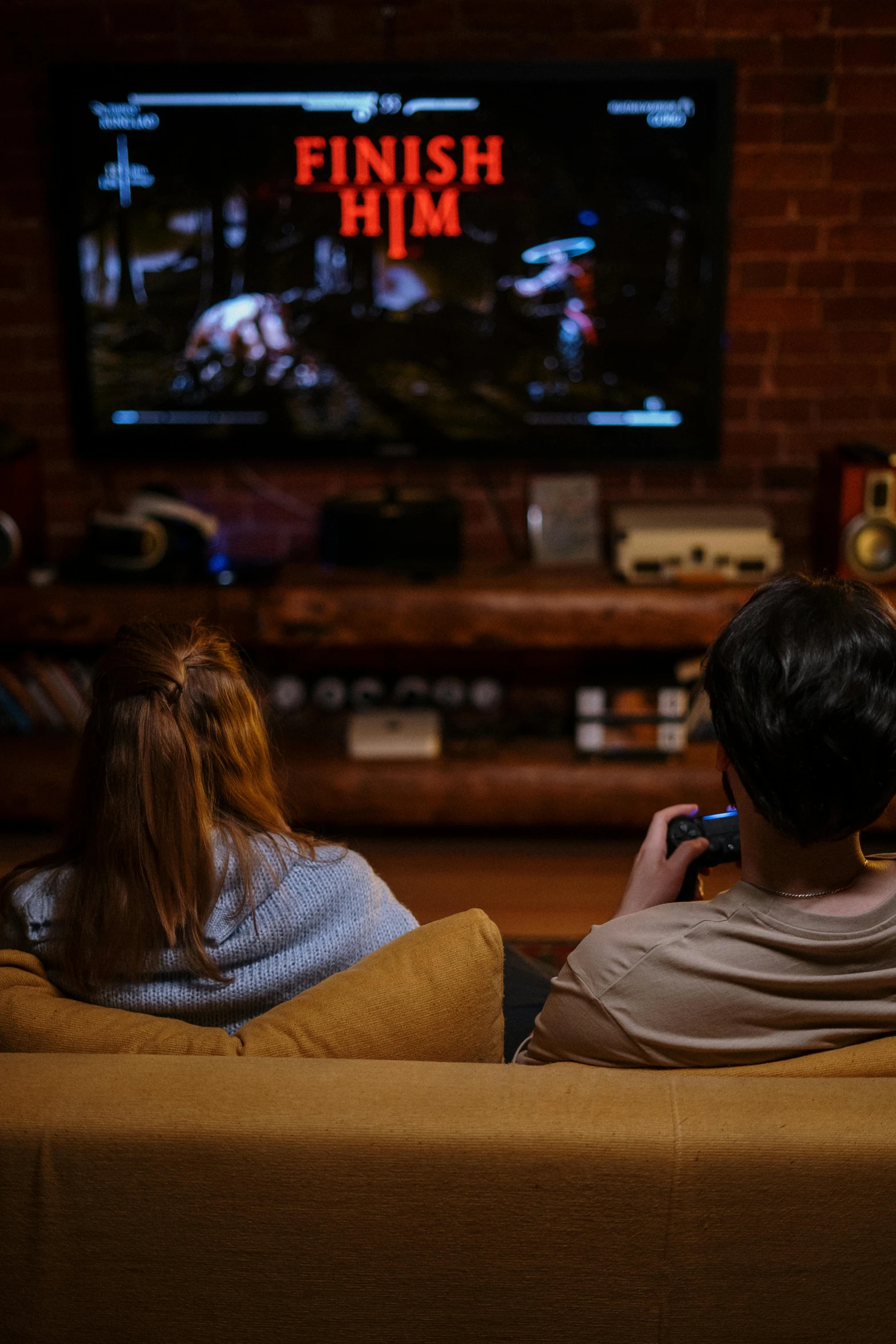 a couple of people sitting on a couch in front of a tv, pexels, video game cinematic, slide show, square, cinematic shot ar 9:16 -n 6 -g