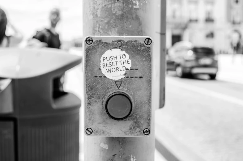 a close up of a street sign on a pole, a black and white photo, by Daniel Gelon, unsplash, street art, tactile buttons and lights, at the end of the world, purpose is pump, first-person