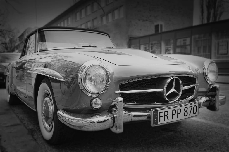 a black and white photo of an old mercedes, pexels contest winner, with instagram filters, 3 ds max + v - ray, speedster, desaturated!