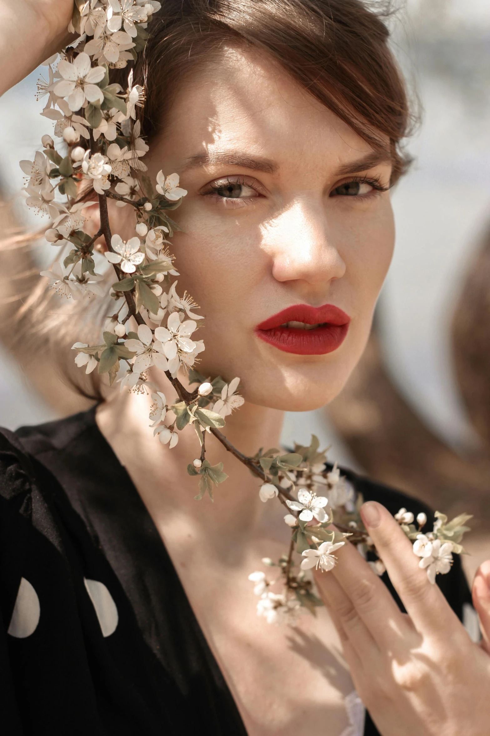 a woman with a flower crown on her head, inspired by Mihály Munkácsy, trending on pexels, milla jovovich, spring season, red lips, white blossoms