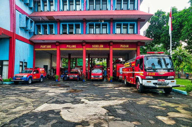 a group of fire trucks parked in front of a building, a photo, by Julia Pishtar, pexels contest winner, hyperrealism, malaysian, square, avatar image, panoramic