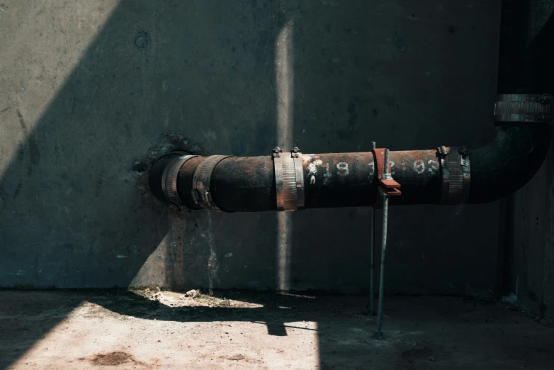 a pipe that is connected to a wall, inspired by Elsa Bleda, pexels contest winner, sewage, thumbnail, mechanical, ignant