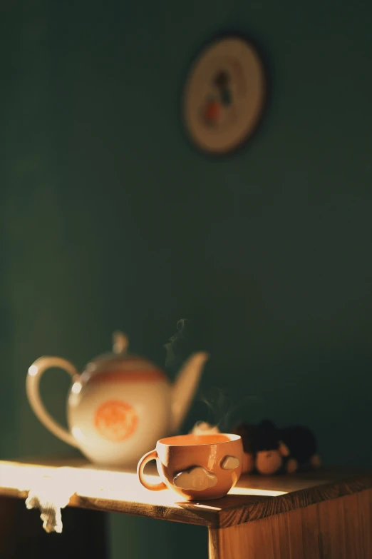 a tea pot sitting on top of a wooden table, by Elsa Bleda, romanticism, cinematic shot ar 9:16 -n 6 -g, mint, breakfast, brown