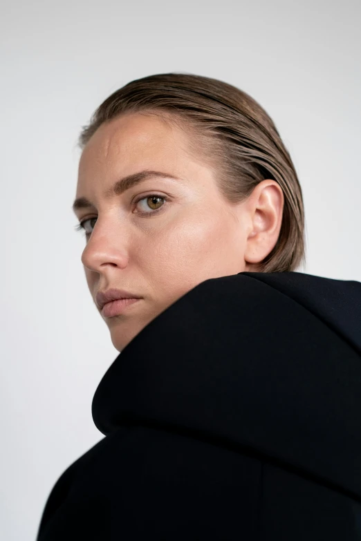 a close up of a person wearing a hoodie, inspired by Anna Füssli, short slicked - back hair, wearing black coat, sanja stikovic, detailed product image