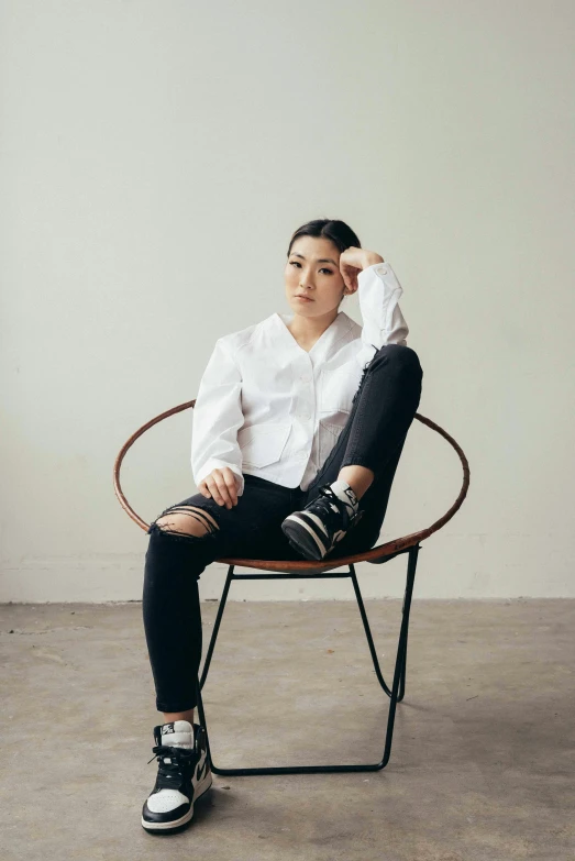 a woman sitting on top of a chair, trending on unsplash, portrait androgynous girl, asian male, wide full body, kailee mandel