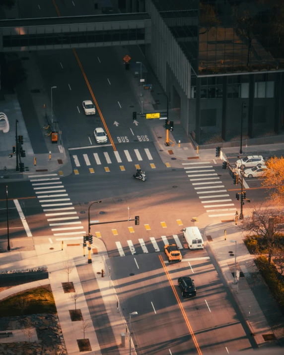 an aerial view of a city street at night, pexels contest winner, crosswalk, in the morning light, thumbnail, square