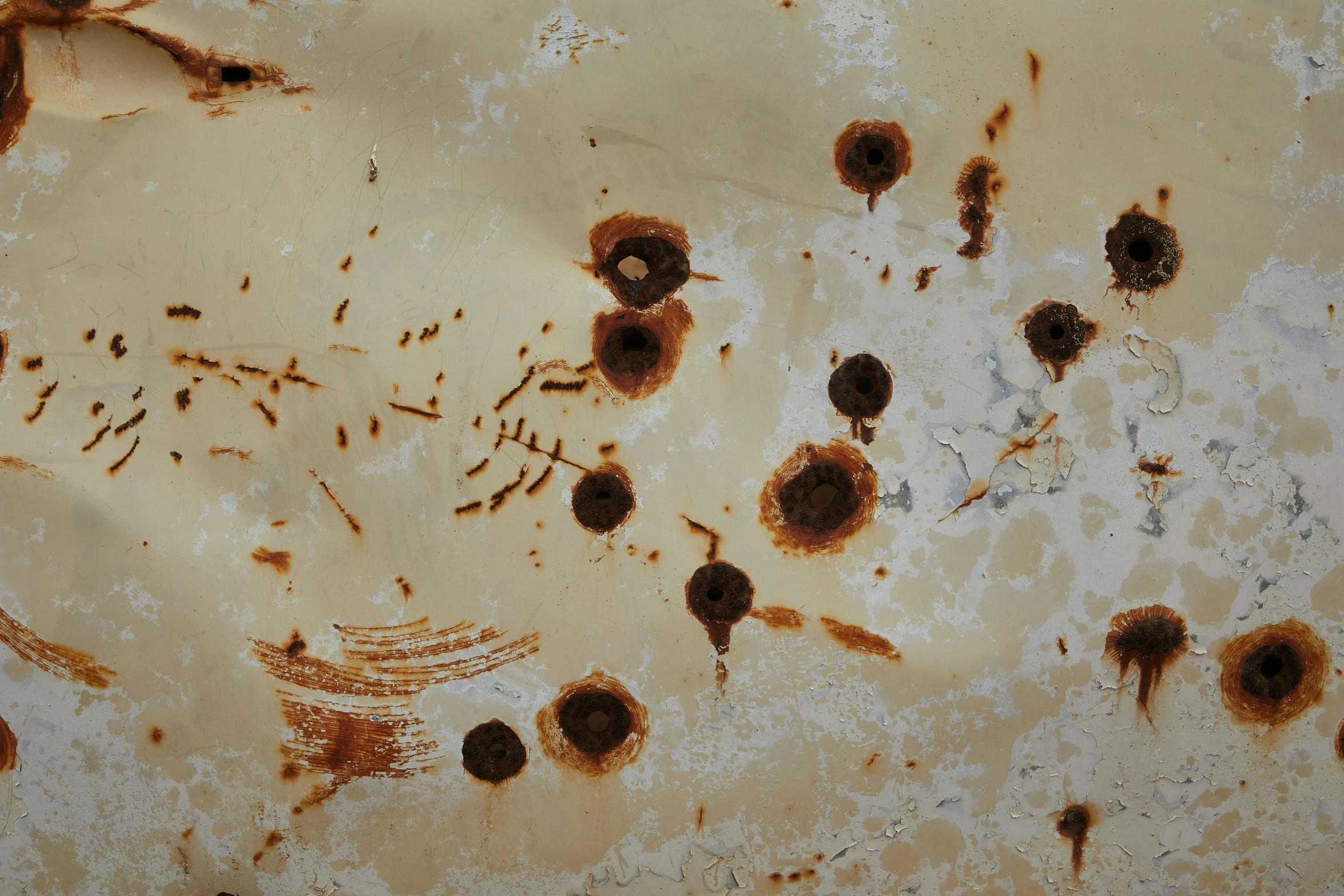 a close up of a rusted surface with bullet holes, inspired by Antoni Tàpies, pexels, gradient brown to white, background image, inside a decayed surgical room, surface hives