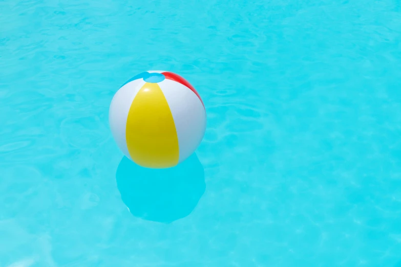 a colorful beach ball floating in a pool, unsplash, plasticien, blue and yellow theme, instagram post, pièce de résistance, panels