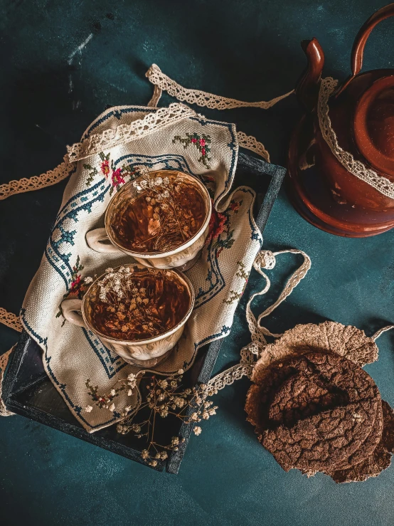 a table topped with bowls of food next to a teapot, by Lucia Peka, pexels contest winner, qajar art, cookies, embroidered velvet, thumbnail, brown