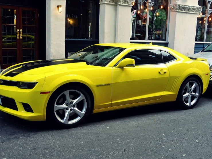 a yellow sports car parked in front of a building, by Carey Morris, pexels contest winner, square, ultra realistic hd, gm, very handsome