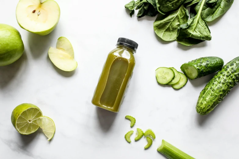 a bottle of green juice surrounded by fruits and vegetables, by Carey Morris, unsplash, set against a white background, background image, morning sunlight, polished