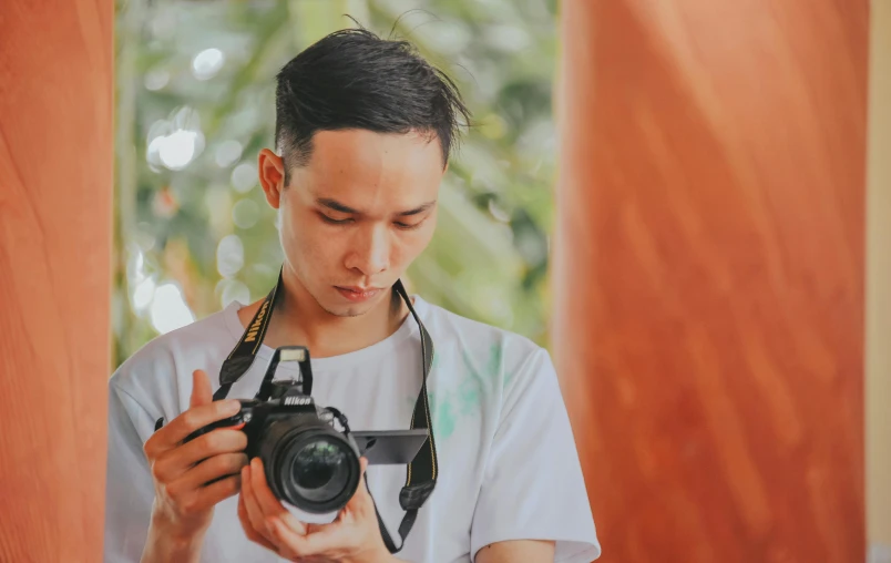 a man taking a picture of himself with a camera, a picture, by Robbie Trevino, pexels contest winner, art photography, cover photo portrait of du juan, headshot profile picture, low quality photograph, vacation photo