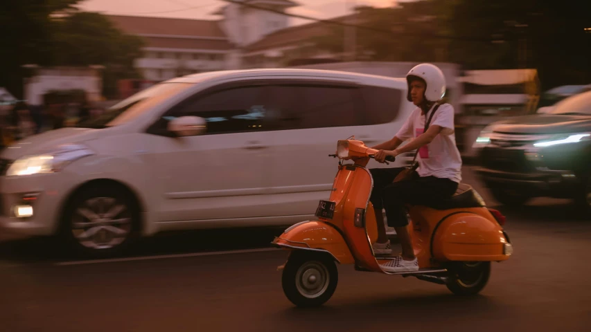 a couple of people riding on the back of a scooter, by Tom Bonson, unsplash contest winner, photorealism, orange glow, bali, square, movie still 8 k