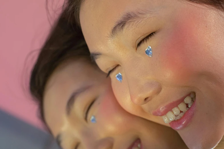 a couple of young girls standing next to each other, trending on pexels, hyperrealism, jimin\'s right eyelid swollen, body covers with neon crystals, happy faces, detailed face of a asian boy