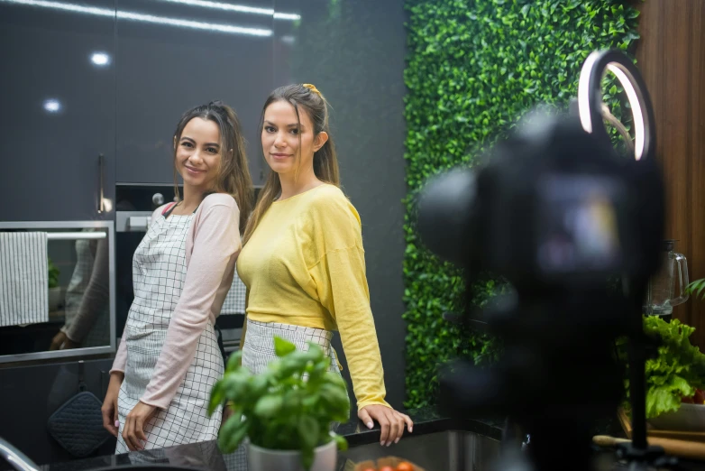 two women standing next to each other in a kitchen, inspired by Gina Pellón, pexels contest winner, tiktok 4 k uhd image, avatar image, uhq, tv production