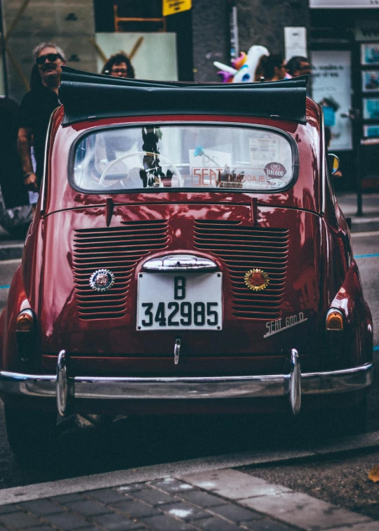 an old red car parked on the side of the road, pexels contest winner, renaissance, 🚿🗝📝, profile image, cute photo, square