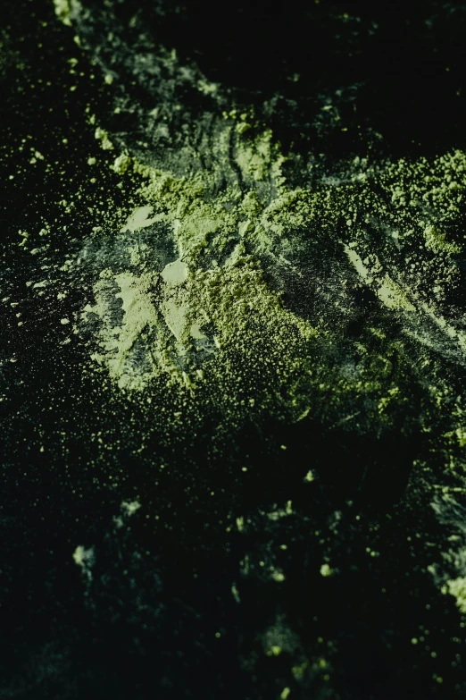 a close up of a green substance on a black surface, inspired by Attila Meszlenyi, lyrical abstraction, burst of powders, 'untitled 9 ', ( ( abstract ) ), mat collishaw