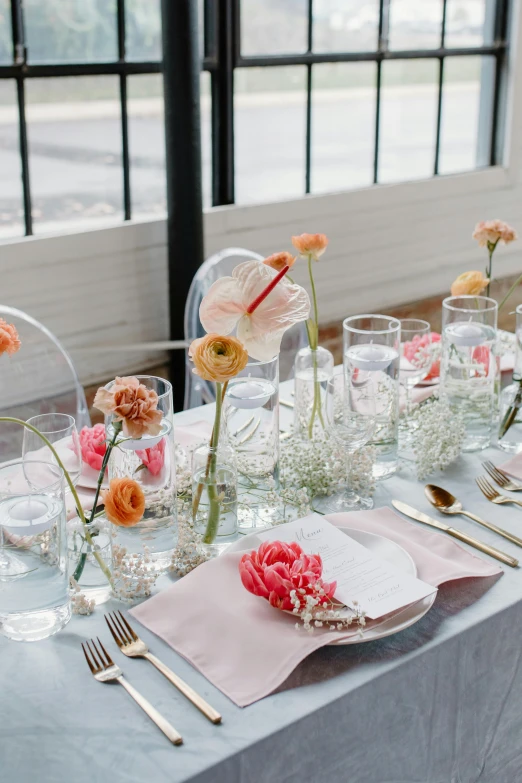 a table that has a bunch of flowers on it, glassware, soft bright pastel, commercially ready, close up details