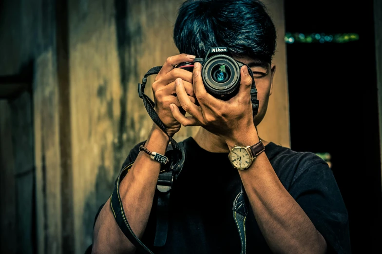 a man taking a picture with a camera, a picture, pexels contest winner, headshot and bodyshot, asian male, detailed focused, colour hd photography