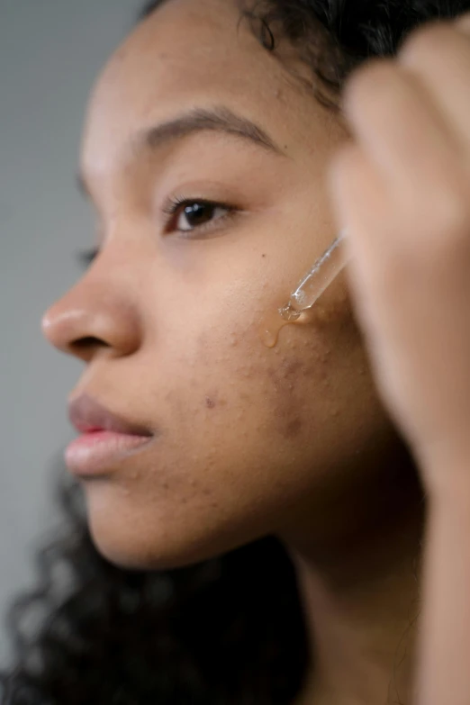 a woman brushes her teeth with a toothbrush, an album cover, trending on pexels, renaissance, face scars, brown skin like soil, pustules, profile image