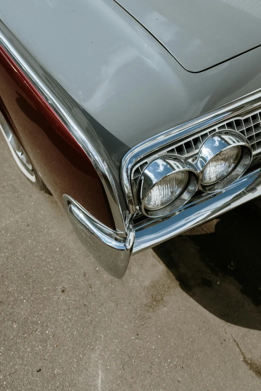 a car parked on the side of the road, pexels contest winner, photorealism, round headlights, metal chrome, brown, museum quality photo