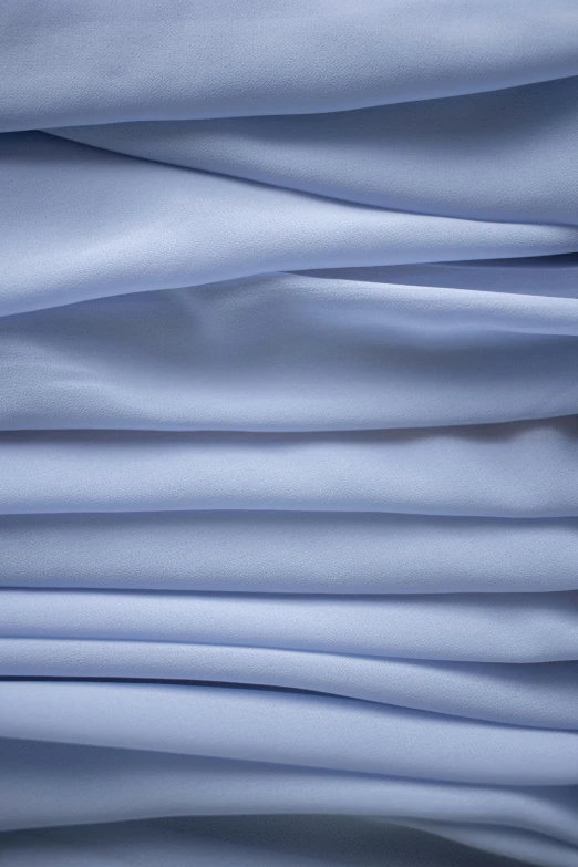 a stack of white sheets stacked on top of each other, inspired by Carlo Randanini, unsplash, blue-fabric, ((blue)), 8k detail, super smooth