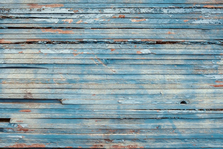 a close up of a wooden wall with peeling paint, by Paul Davis, unsplash, wrapped blue background, 144x144 canvas, wooden houses, vintage - w 1 0 2 4